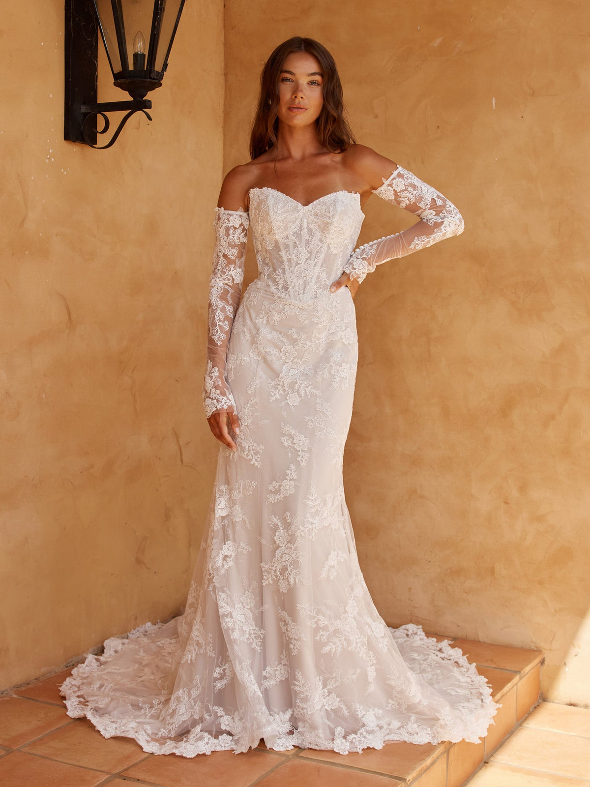 Madi Lane Orlaya gown, strapless floral lace fit-and-flare with detachable sheer lace sleeves and a scalloped lace train